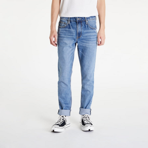 Nohavice GUESS Slim Tapered Jeans Modré